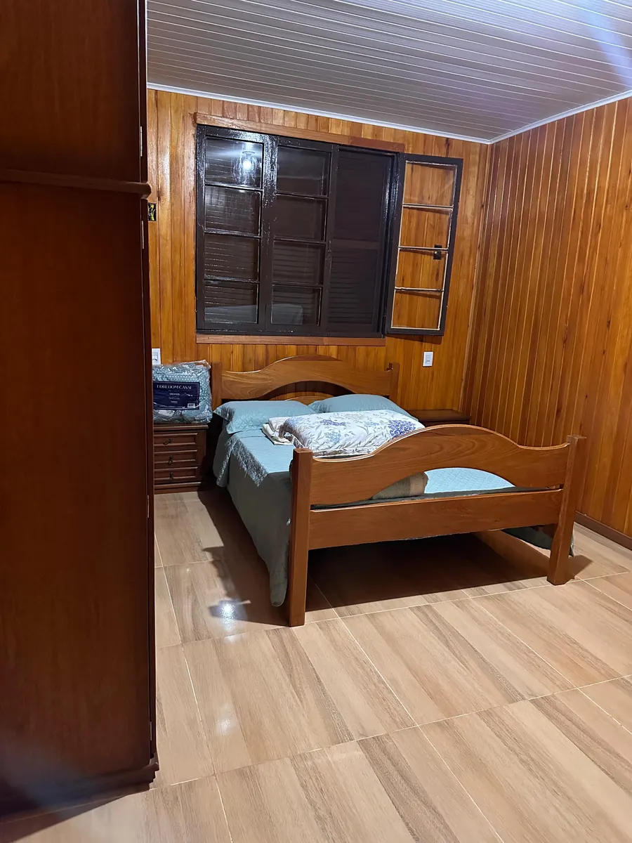 Interior do quarto da Cabana Aconchego